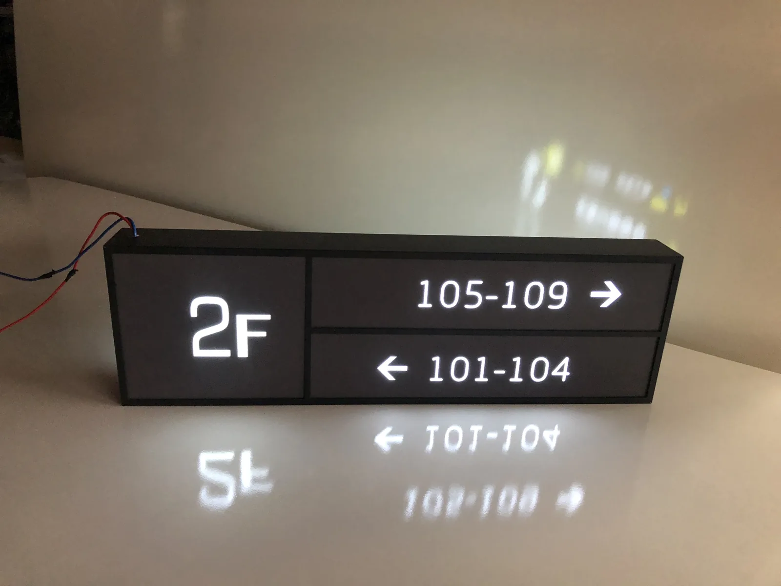 Home Illuminated wayfinding prototype during a light-on review