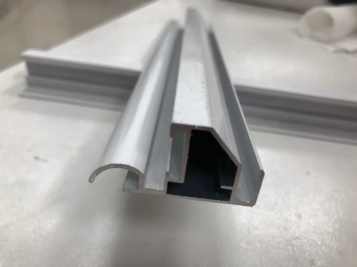 SEG Frames & Custom Profiles Physical rigid-face acrylic light box retainer profile