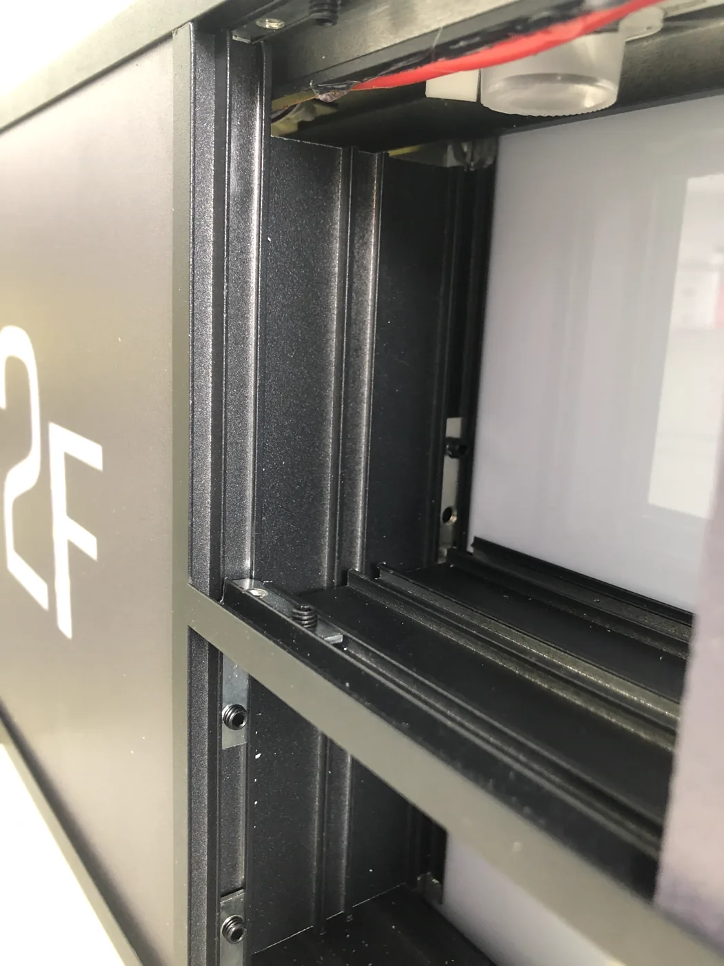 Illuminated Wayfinding Systems Internal wayfinding frame and face-channel interface
