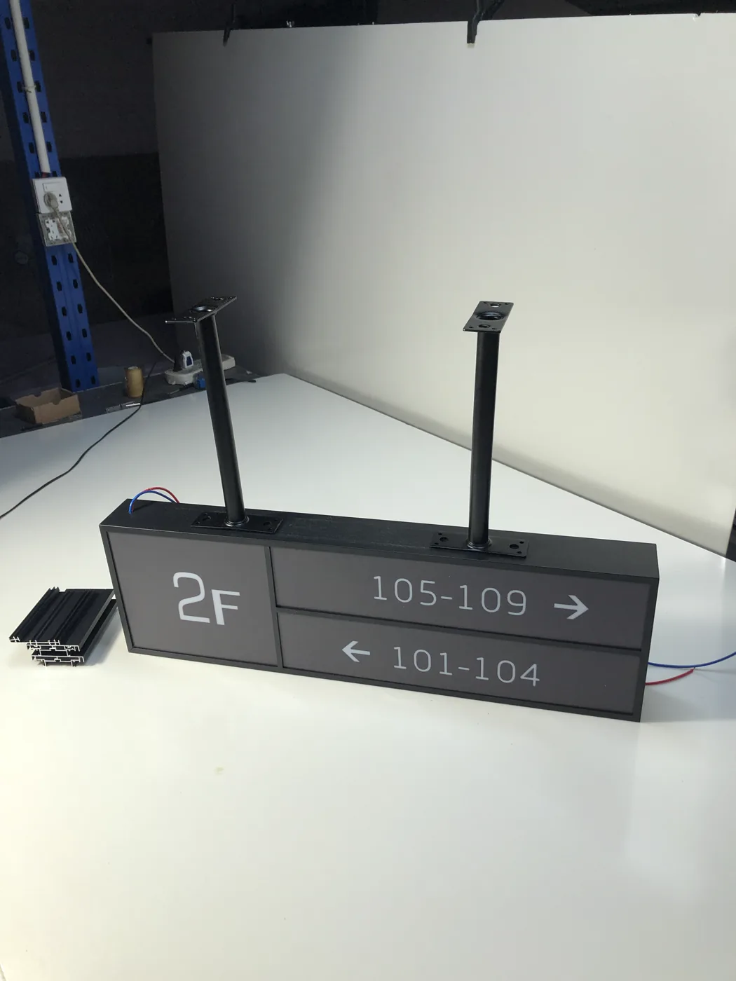 Illuminated Wayfinding Systems Illuminated-wayfinding prototype with suspended mounting rods